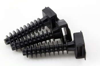 Taco negro para insertar en la superficie y sujetar bridas