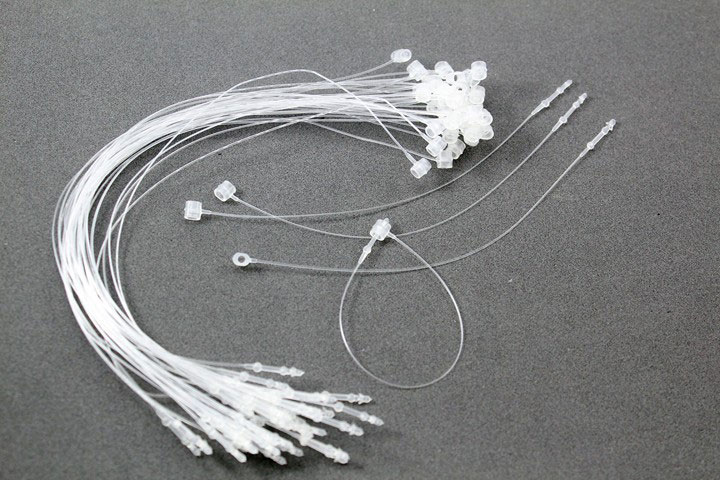 Navetes manuales o hilos de seguridad blancos lisos